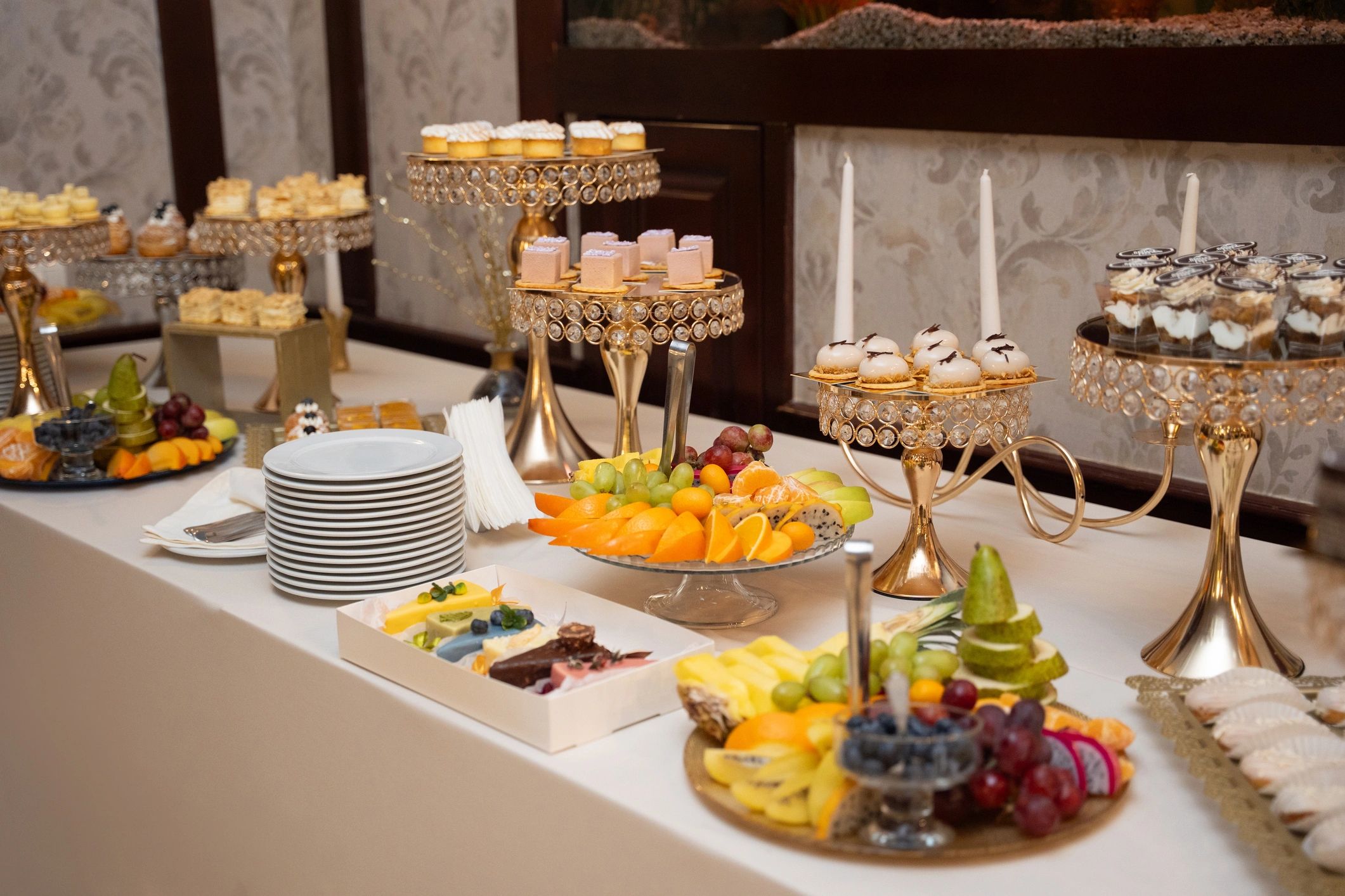 Assorted pastries arranged on an elegant dessert table